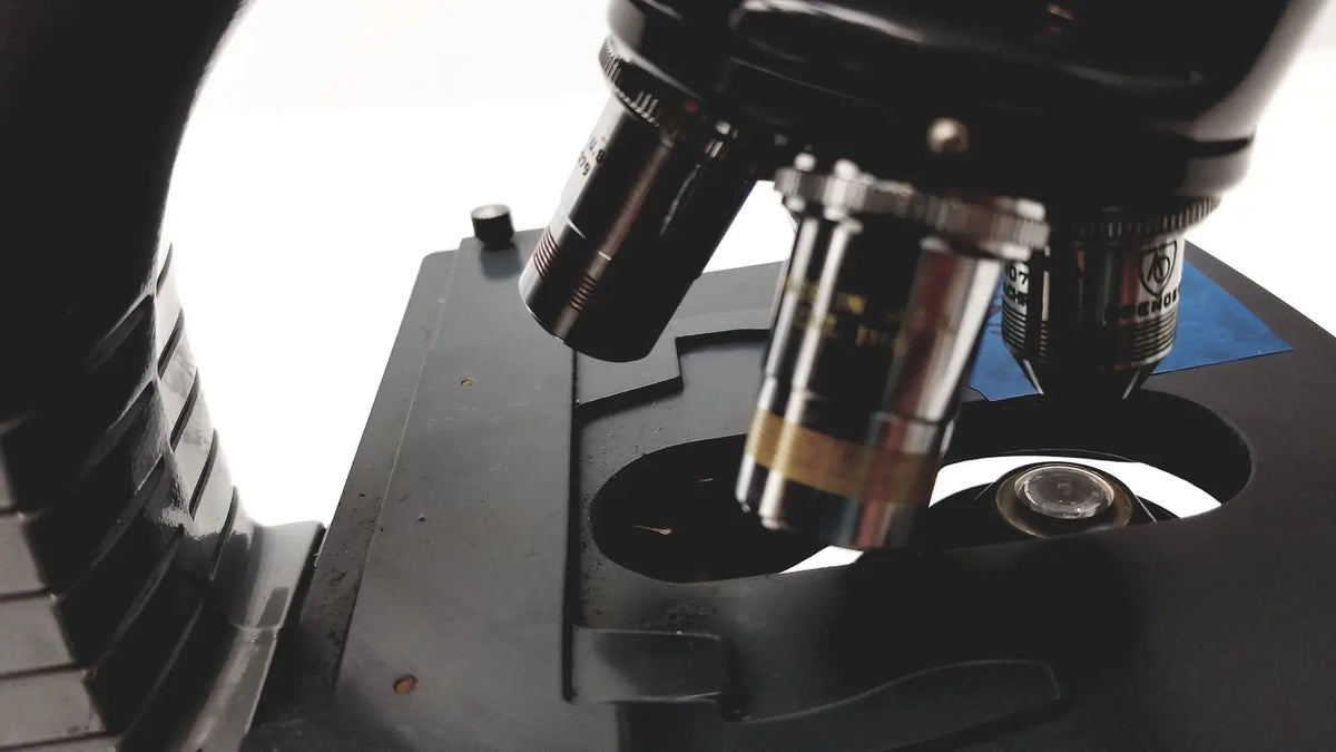 Black metal microscope american optical spencer with chrome accents and adjustable lenses for precision viewing