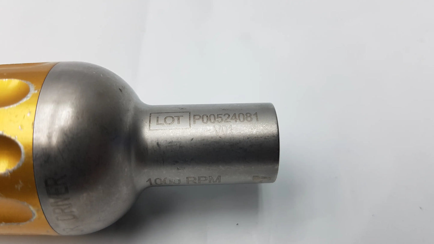 Metallic cylindrical exhaust manifold with gold end cap and engraved lot number for midas rex legend 1000 rpm perforator driver
