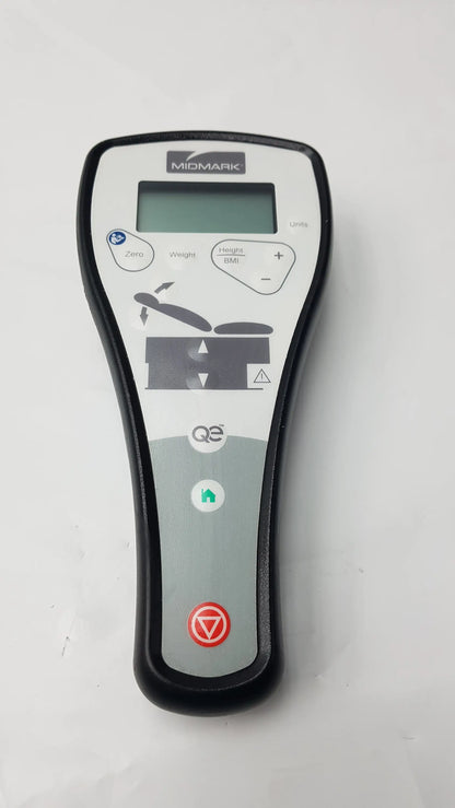 Midmark Qe digital scale with black and gray casing and white control panel for wireless hand remote control use