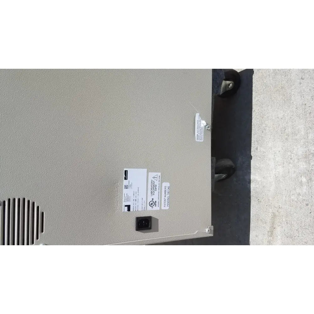 Beige industrial-grade power supply unit with black caster wheels and certification labels for midmark ritter m11-022 ultraclave autoclave steam steri