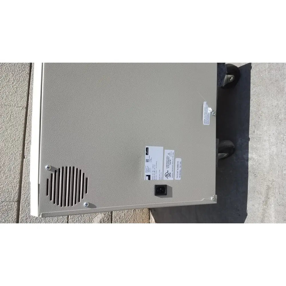 Gray metal industrial enclosure with vented panel and power input port on back of midmark ritter m11-022 ultraclave autoclave steam steri
