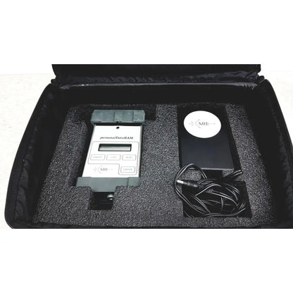 Mie personal dataram real-time aerosol monitor handheld device in white and gray with a black foam case and four function buttons