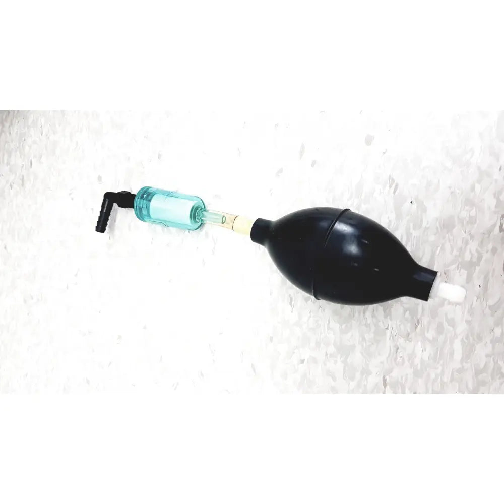 Black rubber bulb with translucent teal glass tube and black fittings on mie personal dataram real-time aerosol monitor