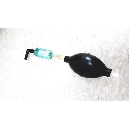 Black rubber bulb with translucent teal glass tube and black fittings on mie personal dataram real-time aerosol monitor