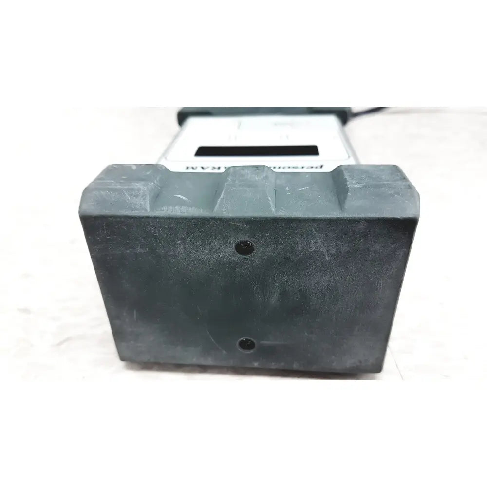 Black plastic base with two holes supporting silver mie personal dataram real-time aerosol monitor pdr-1000an device