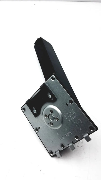 Black plastic and metal hard drive casing with circular metallic plate and screw holes on back of milky way cx p24h g4 monitor stand