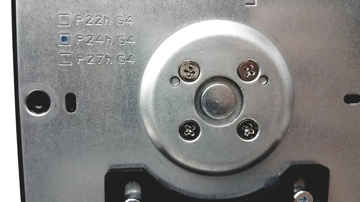 Silver circular metal plate with four screws and central button marked p24h g4 on the back of milky way cx p24h g4 monitor stand