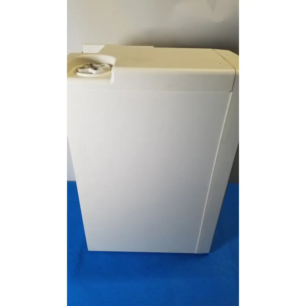 White plastic washing machine with circular control panel for millipore elix essential 5 uv water purification system