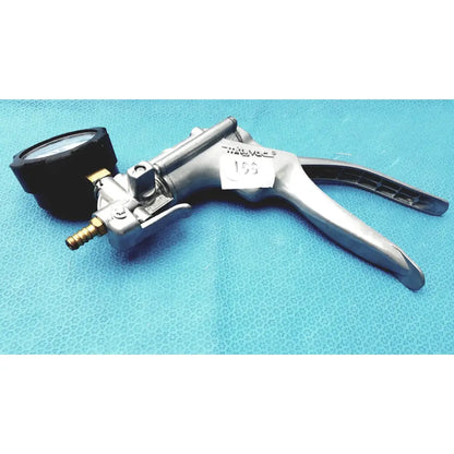 Silver metallic milivac vacuum pump with black pressure gauge and ergonomic handles in mityvac mv8500 elite automotive kit