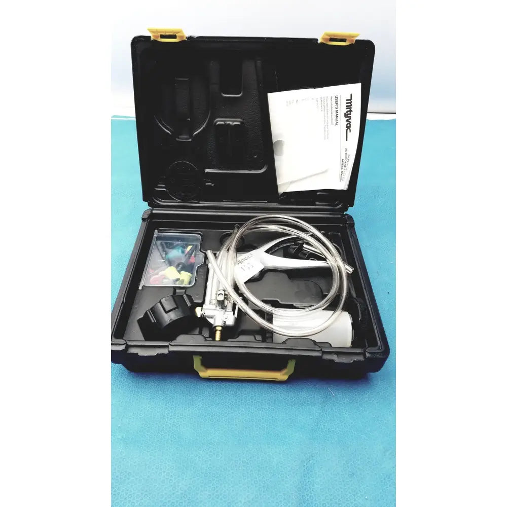Black and yellow mityvac mv8500 elite automotive kit with clear tubing metal components and plastic accessory container