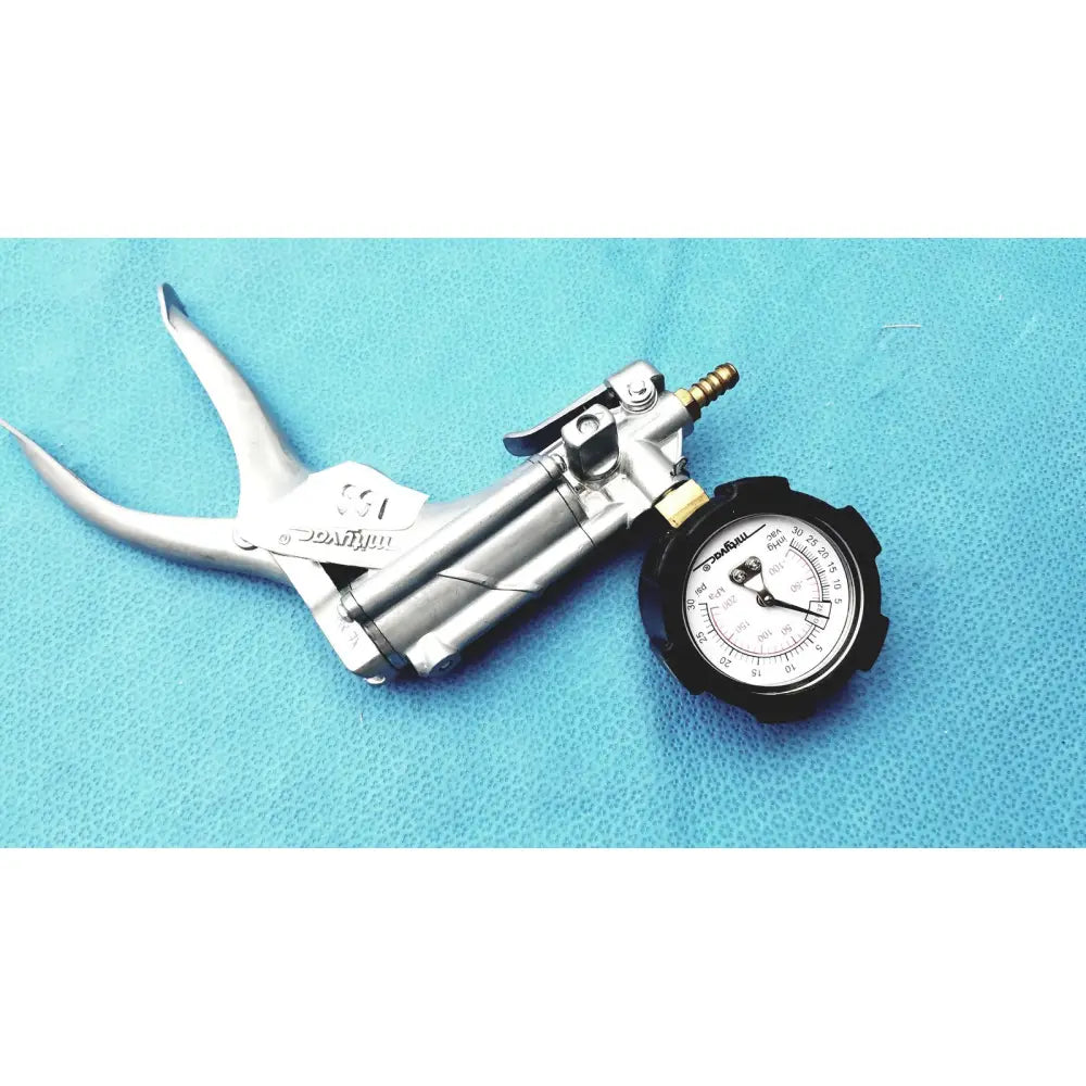 Silver metal air pump with pressure gauge and brass fittings in the mityvac mv8500 elite automotive kit