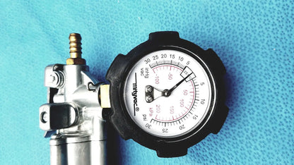 Black-rimmed pressure gauge with white face and silver housing from the mityvac mv8500 elite automotive kit