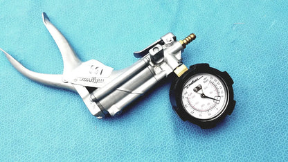 Silver metal air pump with pressure gauge and brass fittings in the mityvac mv8500 elite automotive kit