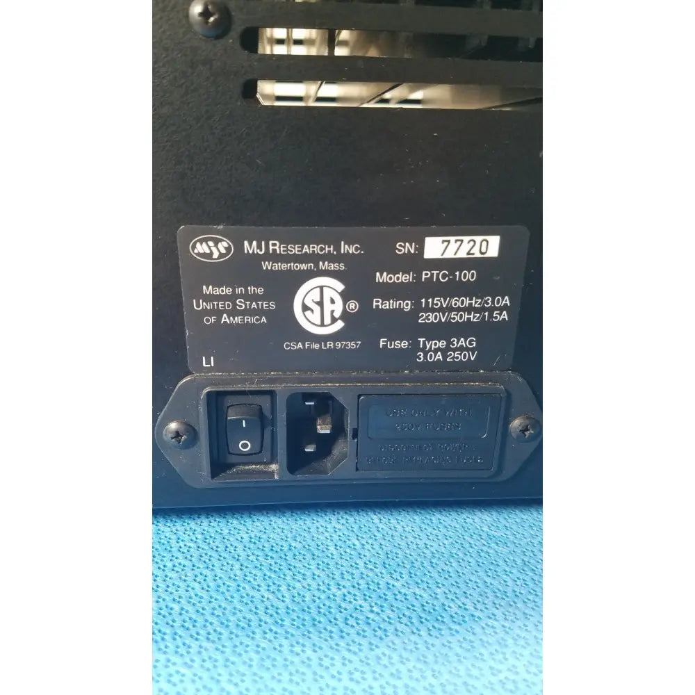Black plastic programmable thermal controller power supply unit by mj research inc model ptc-100 for precise temperature control