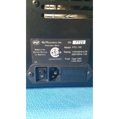 Black plastic programmable thermal controller power supply unit by mj research inc model ptc-100 for precise temperature control