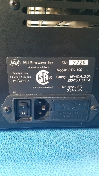 Black plastic programmable thermal controller power supply unit by mj research inc model ptc-100 for precise temperature control