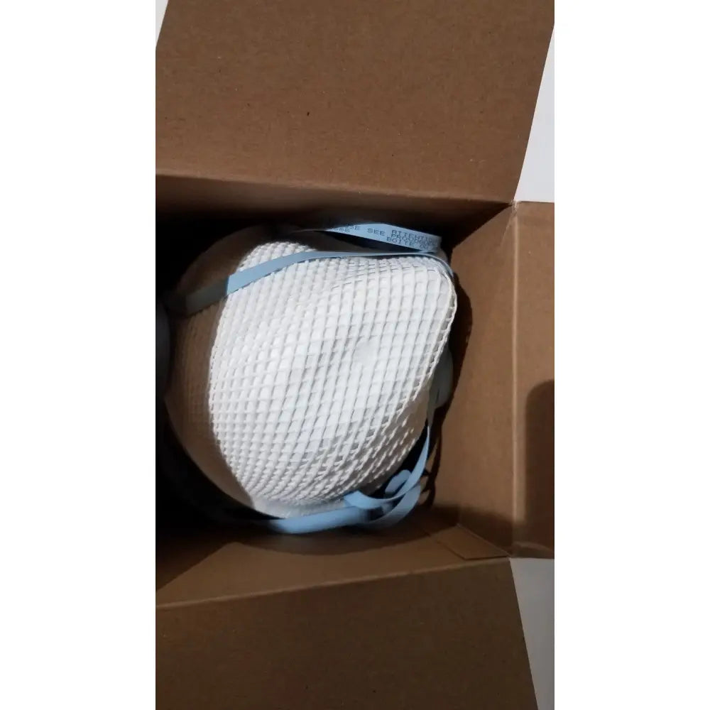Moldex 2200 n95 particulate respirator medium large with white mesh texture and light blue elastic straps for protection