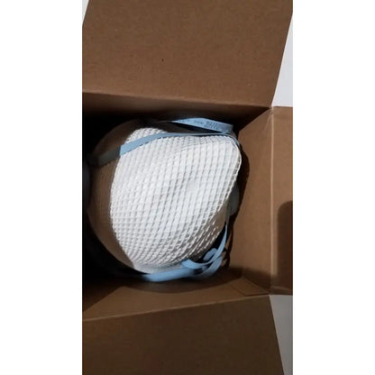 Moldex 2200 n95 particulate respirator medium large with white mesh texture and light blue elastic straps for protection