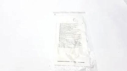 A clear plastic bag with white medical iv fluid bag and printed instructions for molnlycke biogel pl surgical gloves 6 1/2