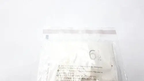 A white plastic bag with a clear seal containing molnlycke biogel pl surgical gloves size 6 1/2 with multilingual text