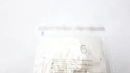 A white plastic bag with a clear seal containing molnlycke biogel pl surgical gloves size 6 1/2 with multilingual text