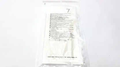 A white sterile gauze pad sealed in clear packaging with instructions and size 7 for molnlycke biogel pl surgical gloves size 7