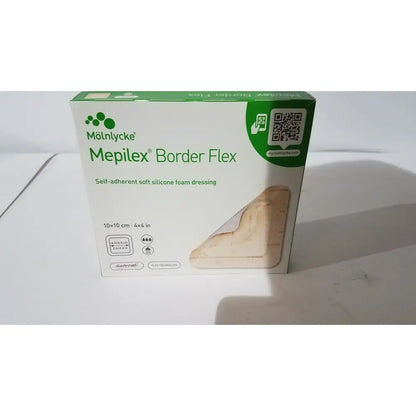 Molnlycke Mepilex Border Flex 4x4 soft silicone foam dressing in white green box with beige adhesive pad visible
