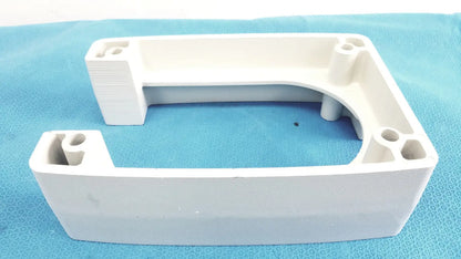 White plastic u-shaped monitor mounting arm bracket with integrated mounting holes and textured edges