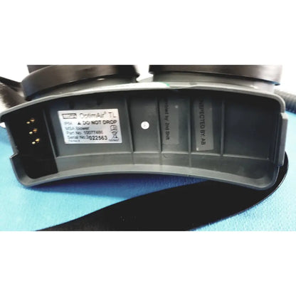 Black plastic msa optimair tl papr blower unit with white label showing serial and model details for industrial use
