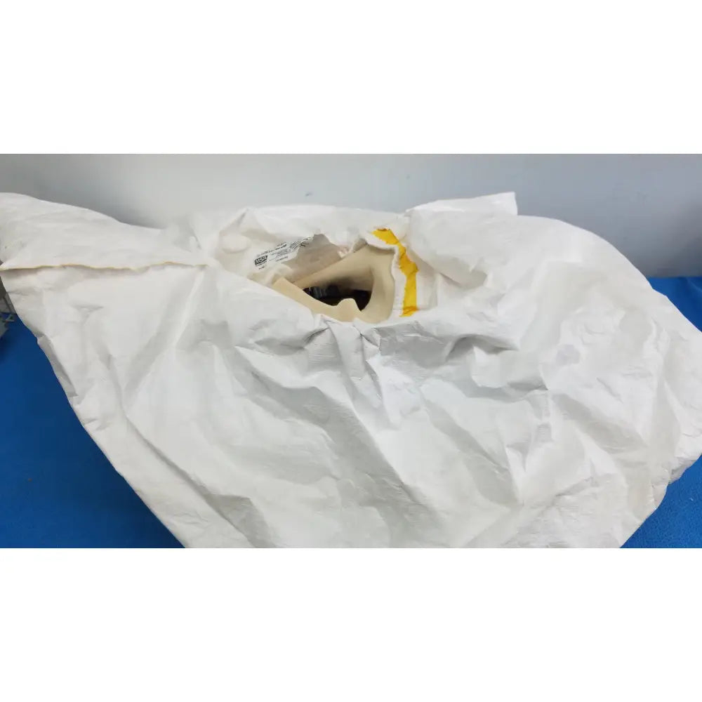 White crinkled protective gown with yellow trim around neckline for msa yellow safety respirator s-cap hood 10078917