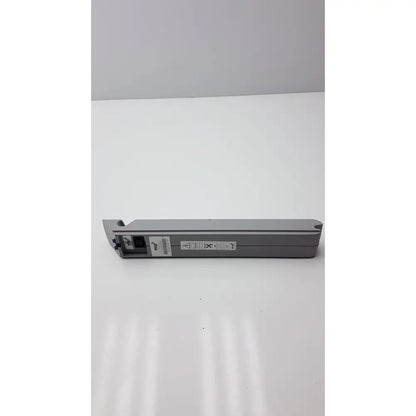 Gray plastic hp printer cartridge with visible labeling used as msp battery 24v dc 4ah for arjo devices