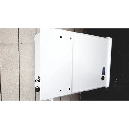 White rectangular outdoor treatment cabinet tc100at with black mounting hardware and a small blue label on right side