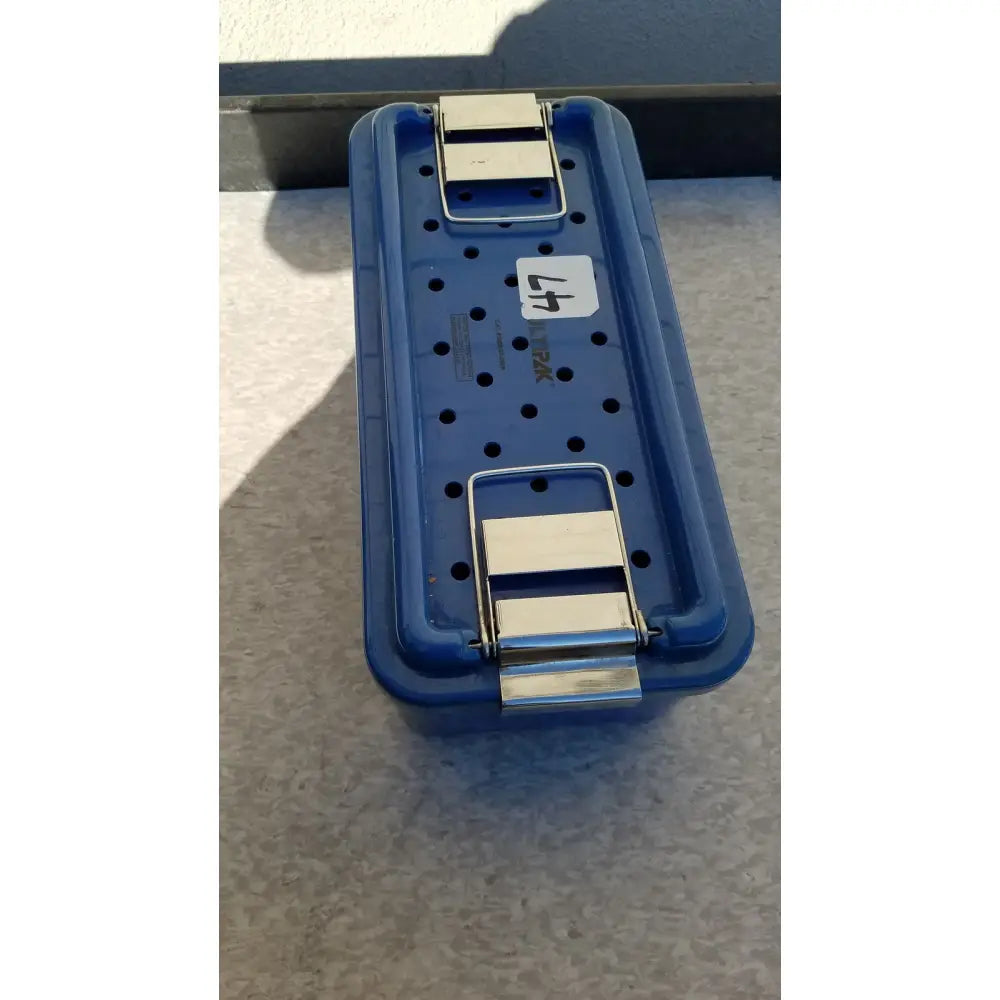 Blue plastic sterilization tray multipak 5006-02-000p with silver metal latches and white label marked 47
