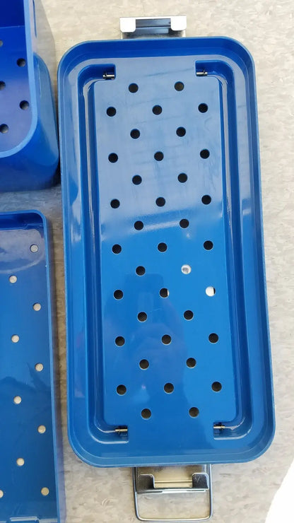 Blue rectangular metal multiPak 5006-02-000p plastic sterilization tray with perforated surface and silver latches