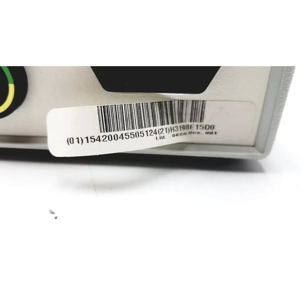 White plastic barcode label with black printed text on the side of myosure hologic hysteroscopic tissue removal control unit