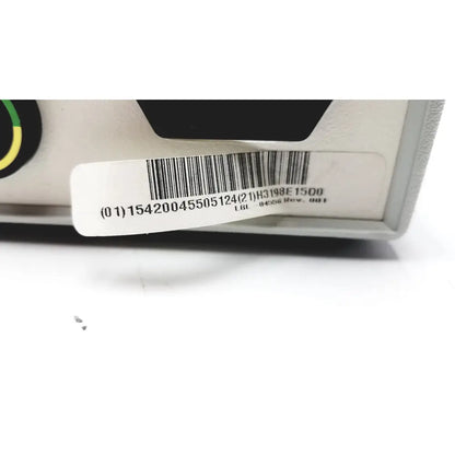 White plastic barcode label with black printed text on the side of myosure hologic hysteroscopic tissue removal control unit