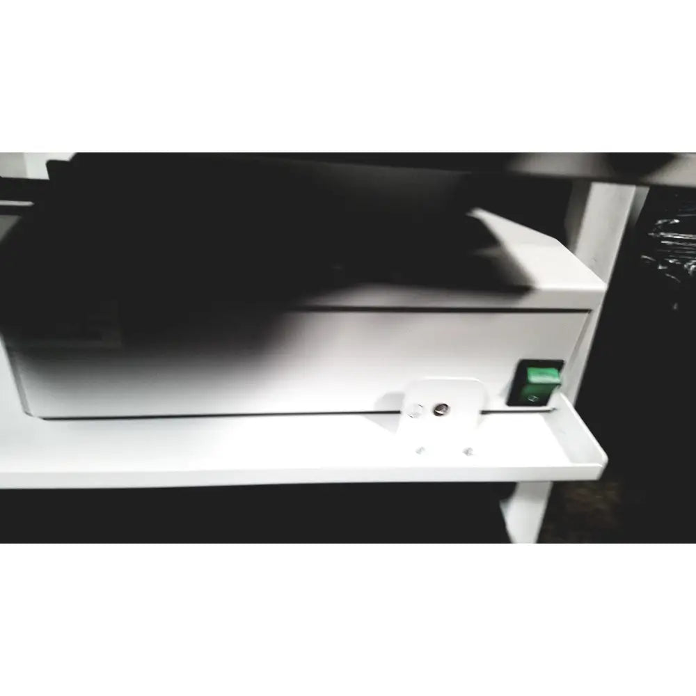 White plastic printer with green power switch of natus neurology nicolet edx base system with cart for neurology use