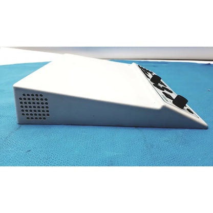 White rectangular electronic control panel with black knobs and vent on the side for natus ultrapro s100 unit