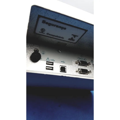 Blue security keypad with silver metallic faceplate and usb ethernet dvi ports on the back of natus ultrapro s100 unit control panel
