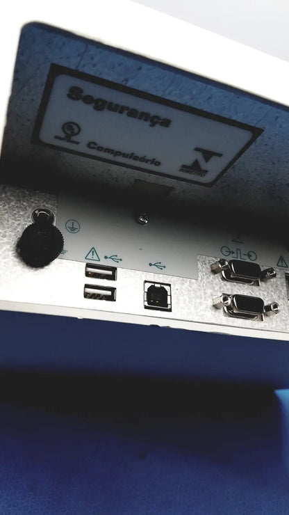 Blue security keypad with silver metallic faceplate and usb ethernet dvi ports on the back of natus ultrapro s100 unit control panel
