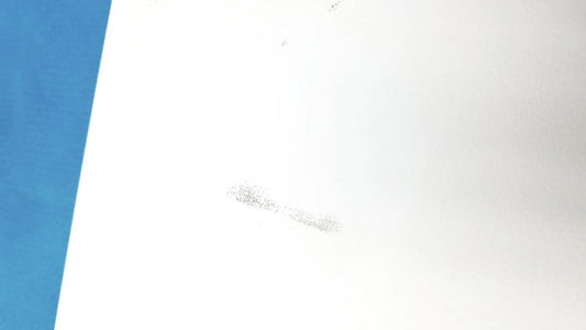 A faint gray smudge on the white surface of the natus ultrapro s100 unit control panel