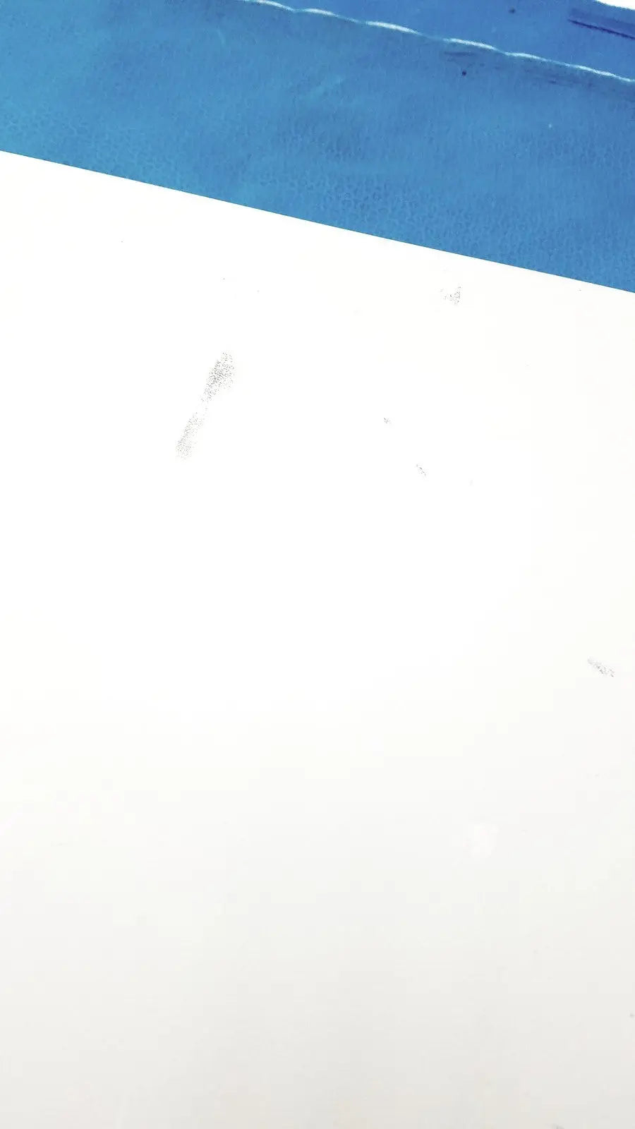 White and blue textured surface of the natus ultrapro s100 unit control panel showing the s100 unit control details