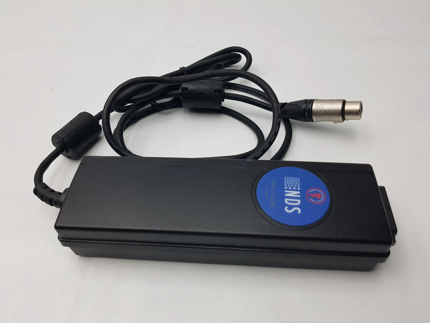 Black rectangular medical power supply bpm150s24f06 with coiled cable and silver xlr connector featuring blue inds sticker