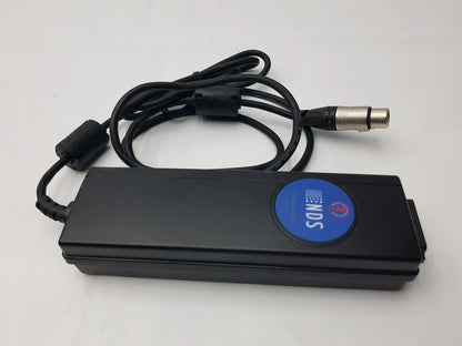 Black rectangular medical power supply bpm150s24f06 with coiled cable and silver xlr connector featuring blue inds sticker