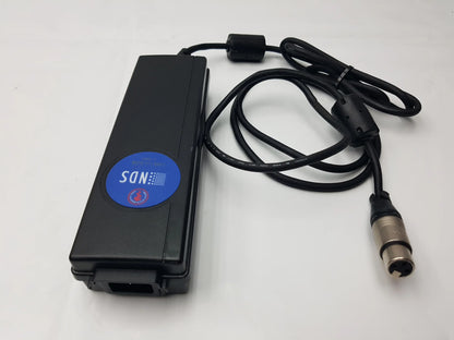 Black rectangular medical power supply bpm150s24f06 with blue logo and coiled cable ending in metallic xlr connector