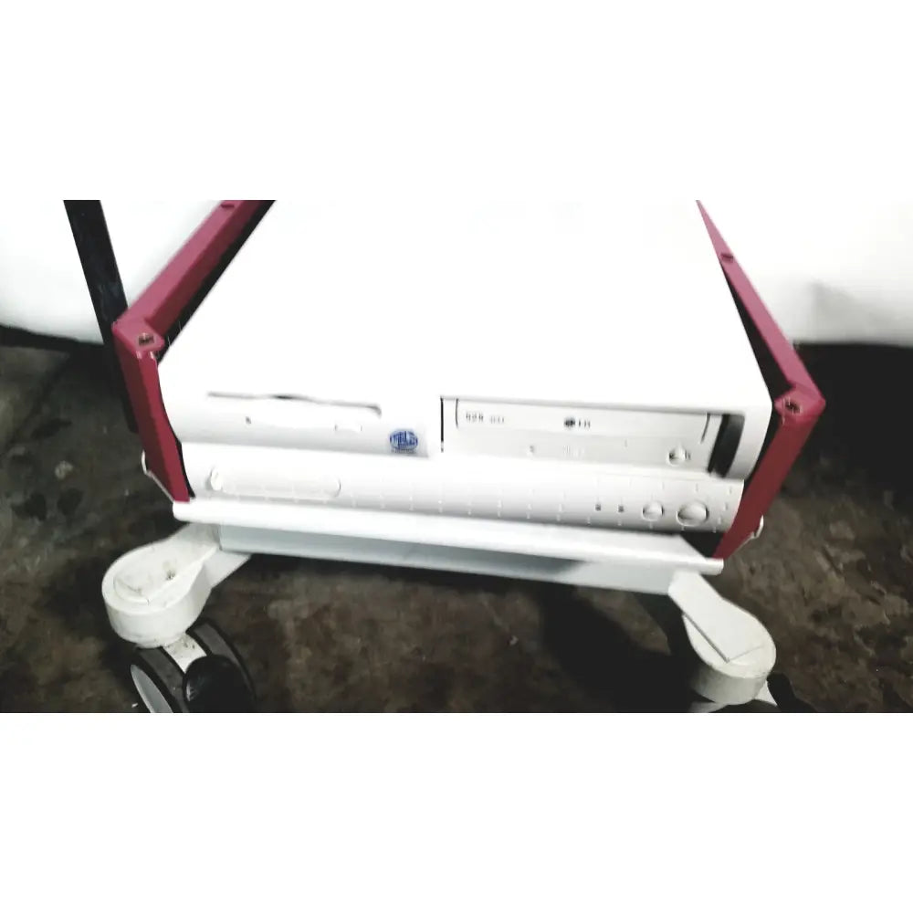 White nec laborie aquarius ct urodynamic analyzer desktop computer with red cart frame and integrated cd-rom drive