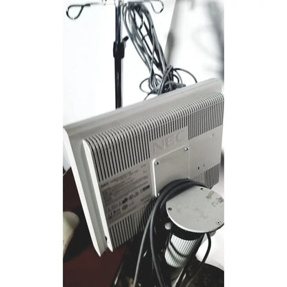 Silver-colored nec laborie aquarius ct urodynamic analyzer back panel with ribbed design and visible nec laborie logo