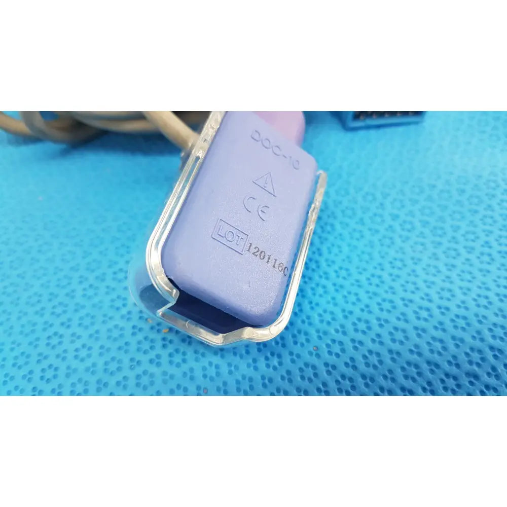 Purple plastic spo2 adapter cable with metallic silver frame marked doc-10 ce lot 120116c for reliable monitoring