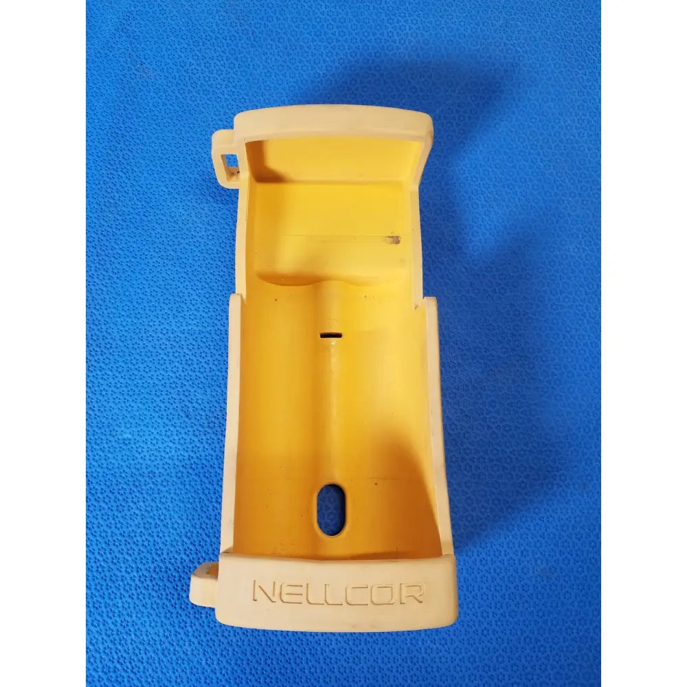 Yellow plastic nellcor puritan bennett portable pulse oximeter housing with molded branding for n-20 model case