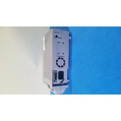 Gray plastic nellcor puritan bennett oximax n-560 pulse oximeter spo2 patient monitor back with vent and ports